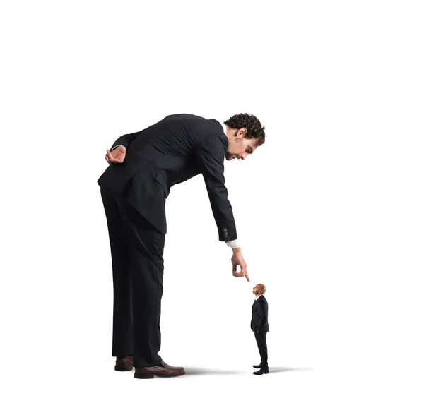 depositphotos 130857328 stock photo businessman pointing a small man 31 Signals Exhibited By Weak Minded People